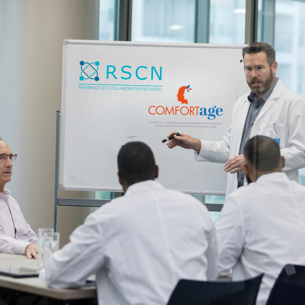 group of men in what looks like a research meeting, as example of ccf meets to discuss personalised dementia and frailty care solutions